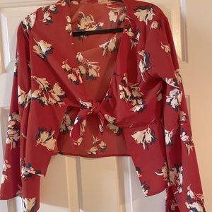 Red blouse with tie in front